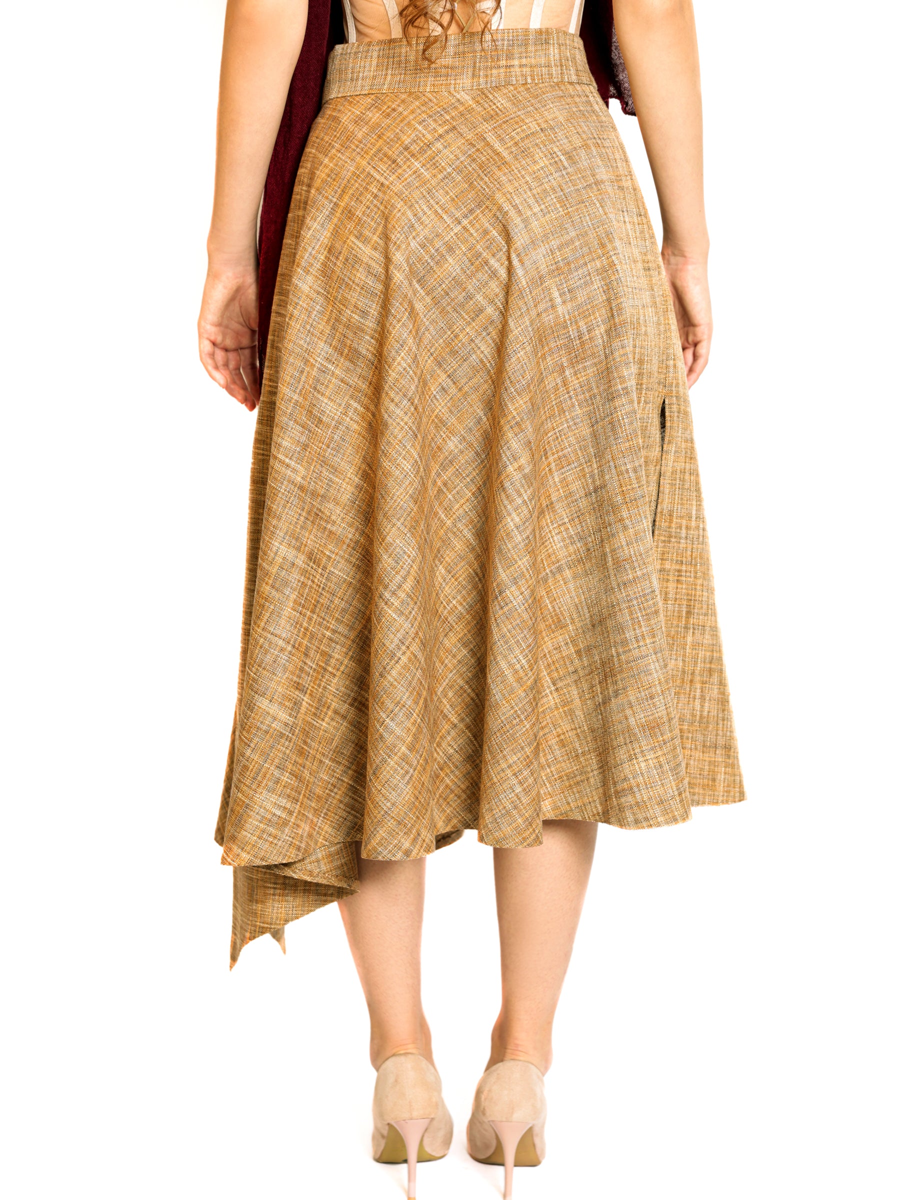 Back view of a camel gold plaid midi skirt shown from waist to toe, highlighting the asymmetric hemline.